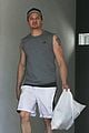 jeremy renner bulging biceps superhero workout 06