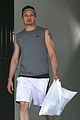 jeremy renner bulging biceps superhero workout 08