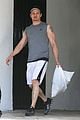 jeremy renner bulging biceps superhero workout 10