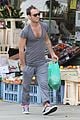 jude law flaunts his muscles in low cut t shirt 01
