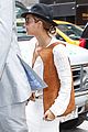 beyonce looks summer chic in white dress with fedora 06