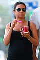 ashton kutcher plants a sweet kiss on pregnant mila kunis 02