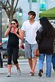 ashton kutcher plants a sweet kiss on pregnant mila kunis 16