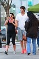 ashton kutcher plants a sweet kiss on pregnant mila kunis 18