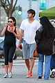 ashton kutcher plants a sweet kiss on pregnant mila kunis 20