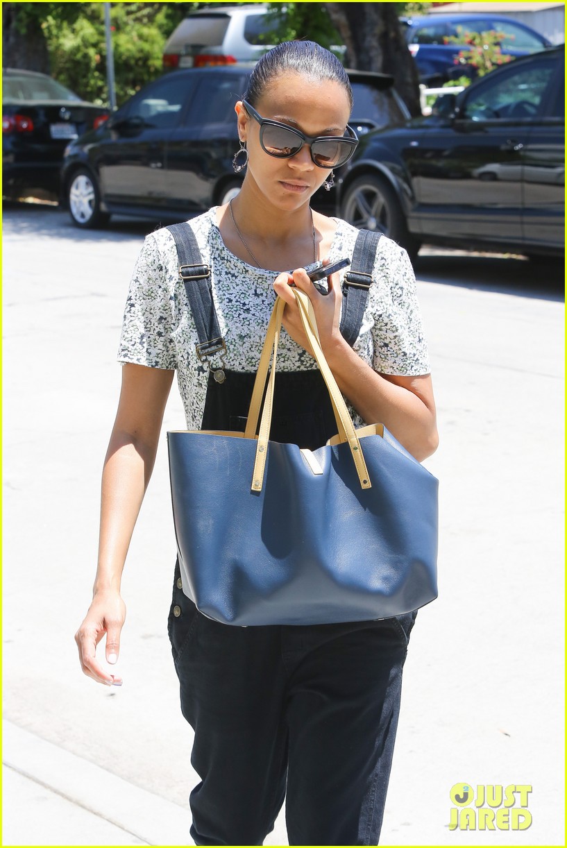 Zoe Saldana Covers Her Belly After Pregnancy Rumors Surface: Photo