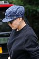 jennifer lopez keeps all her hair up under her hat 05