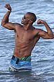 shemar moore shirtless flexes muscles beach 05