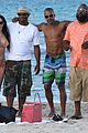 shemar moore shirtless flexes muscles beach 13