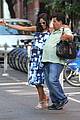 rosario dawson luis guzman compare their big bellies 01