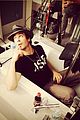 ian somerhalder sits in bathtub with clothes on 05