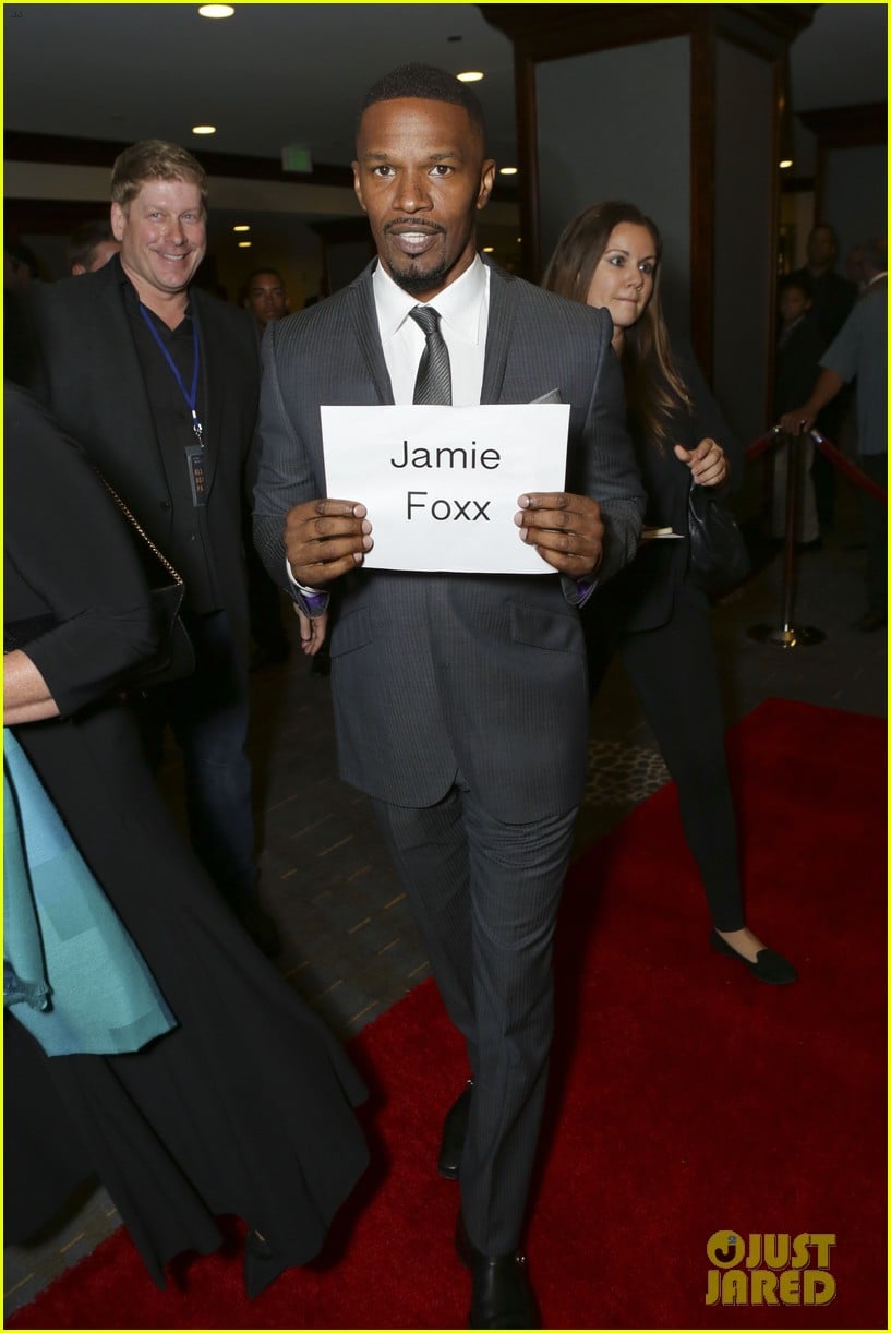 Jamie Foxx Carries a Sign with His Name On it, Just in Case Photo