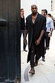 kanye west reacts to boos after late fashion show arrival 01