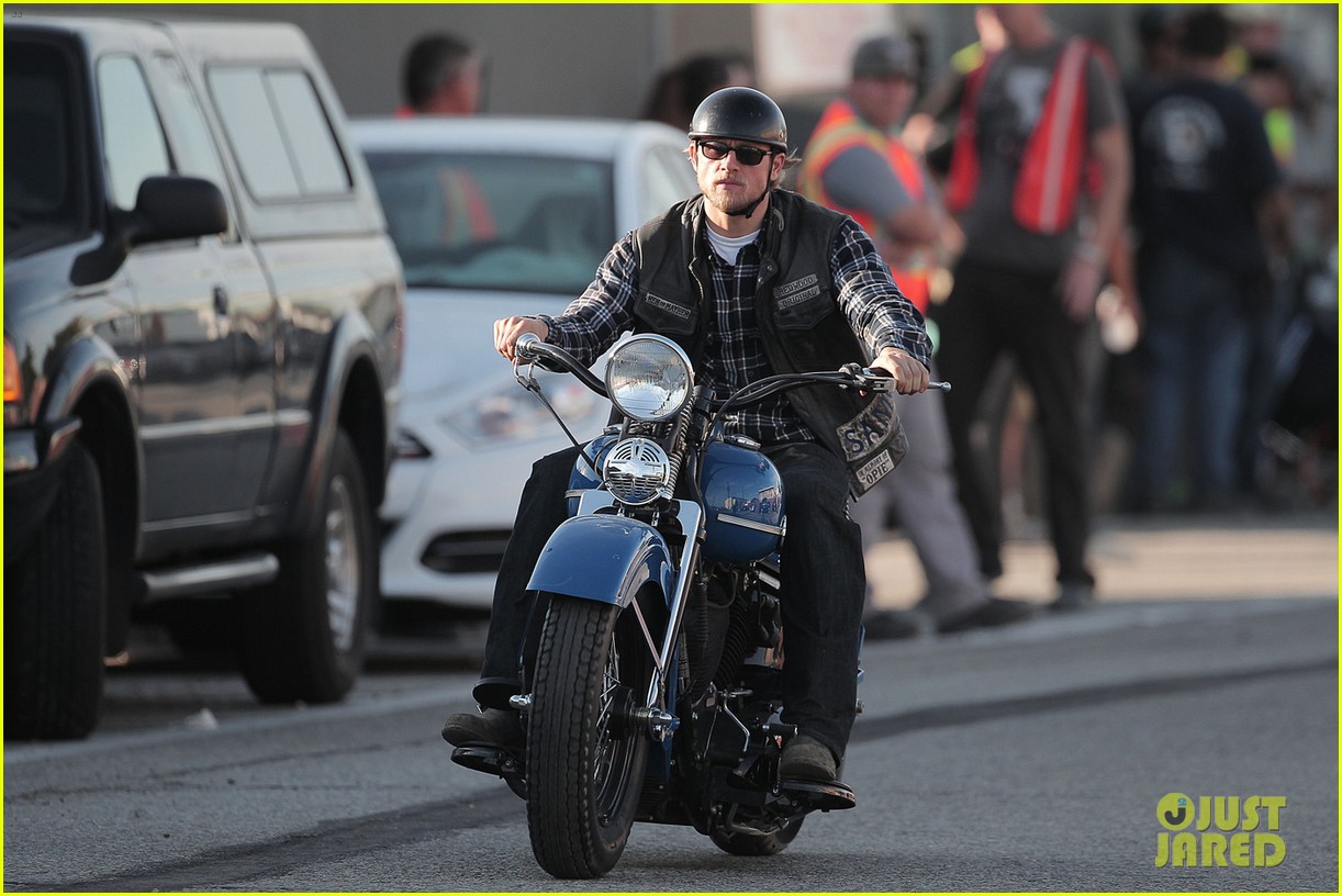 Charlie Hunnam looks badass while riding his motorcycle for Sons of Anarchy...
