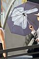 jennifer lawrence gives the middle finger with her umbrella 19