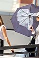 jennifer lawrence gives the middle finger with her umbrella 20