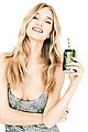 rosie huntington whiteley looks happy to drink coca cola life 04