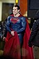 henry cavill hangs in the air in superman costume 02