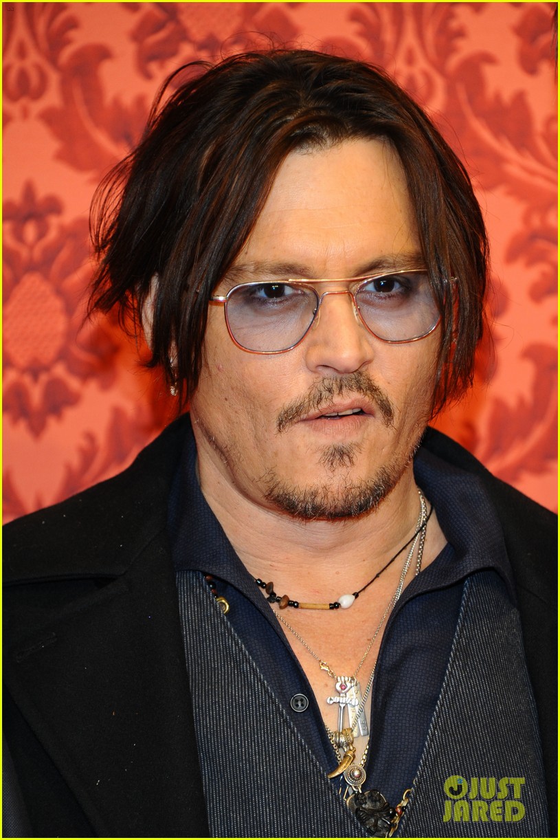 Johnny Depp Dons Trenchcoat to 'Mordecai' Berlin Premiere: Photo
