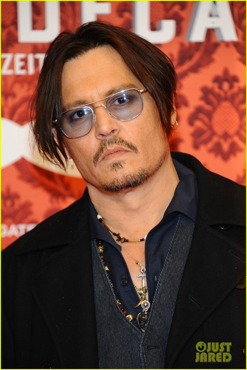 Johnny Depp Dons Trenchcoat to 'Mordecai' Berlin Premiere: Photo