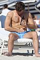 alex pettyfer goes shirtless sexy for miami beach day 03