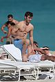 alex pettyfer goes shirtless sexy for miami beach day 09