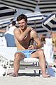 alex pettyfer goes shirtless sexy for miami beach day 10