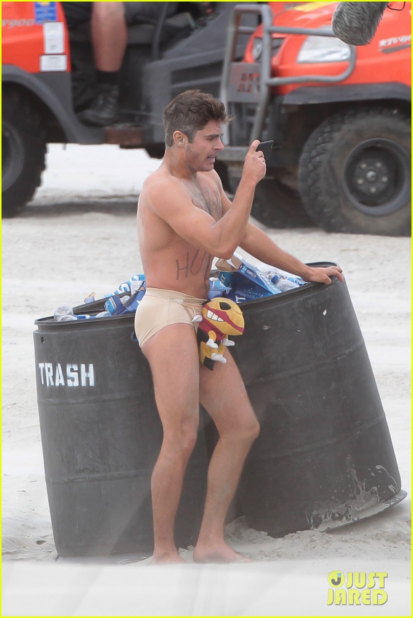 Zac Efron Runs Around Shirtless & Nearly Naked in These Amazing Photos!...