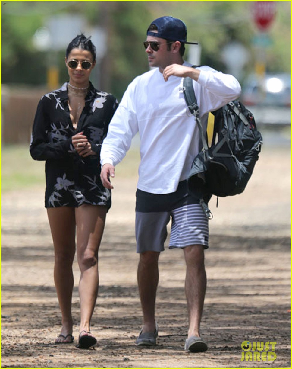 Zac Efron and his girlfriend Sami Miro hold hands while going for a stroll ...