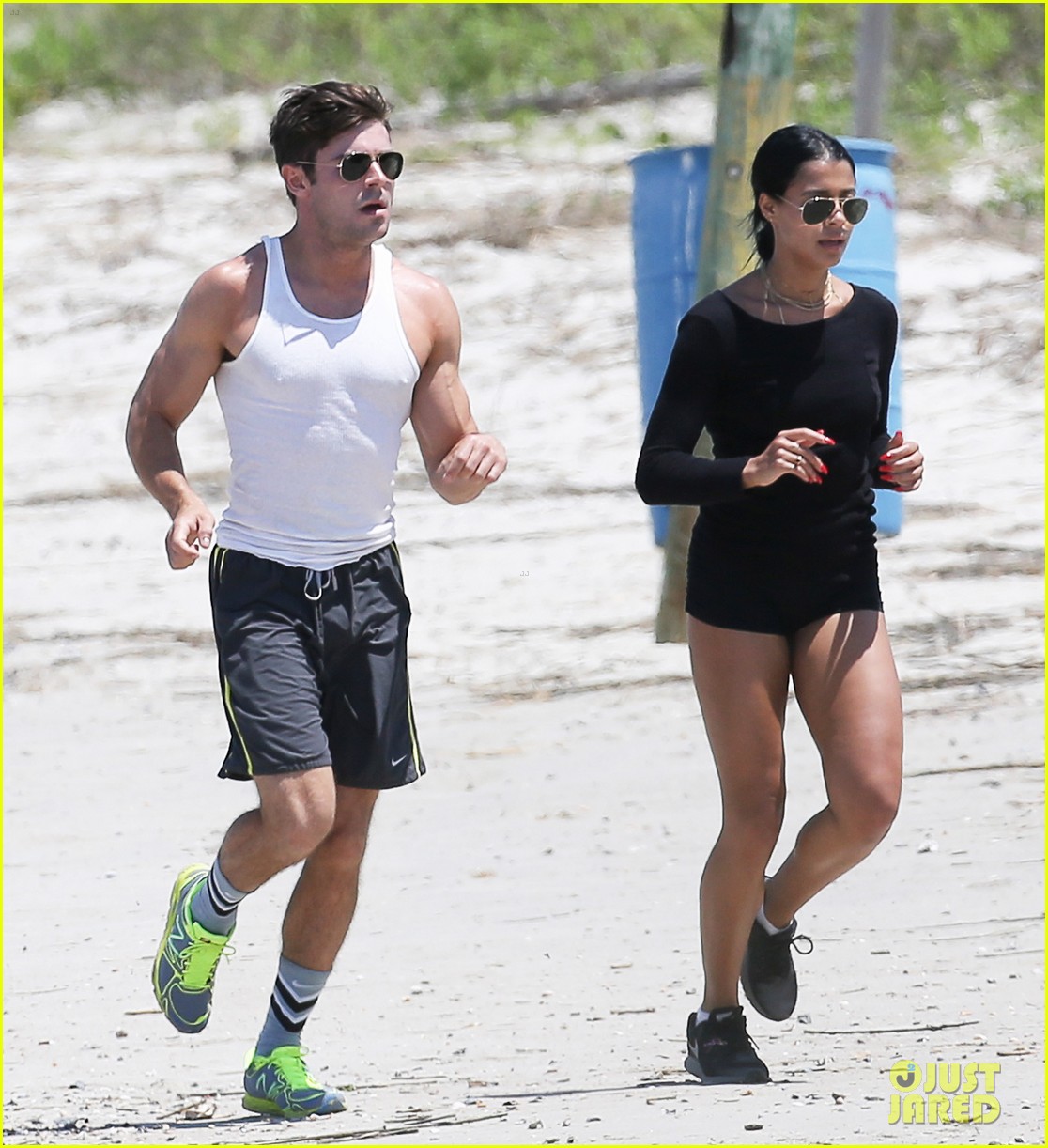 zac efron sami miro work our together on the beach 013362206