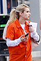 emma roberts orange jumpsuit abigail breslin queens set 08