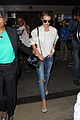 rosie huntington whiteley arrives LAX after paris fashion week 13