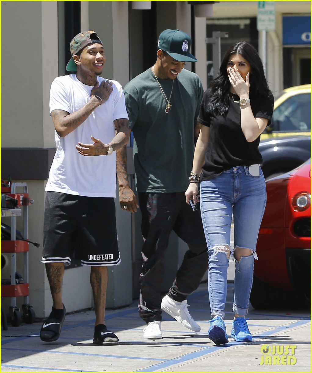 Kylie Jenner steps out with her boyfriend Tyga to visit a children's h...
