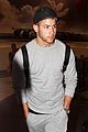 nick jonas sweatpants for flight out lax 01