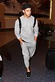 nick jonas sweatpants for flight out lax 03
