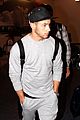 nick jonas sweatpants for flight out lax 04