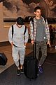 nick jonas sweatpants for flight out lax 09
