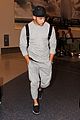 nick jonas sweatpants for flight out lax 10