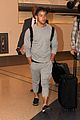 nick jonas sweatpants for flight out lax 11