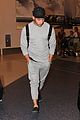 nick jonas sweatpants for flight out lax 13