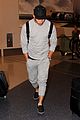 nick jonas sweatpants for flight out lax 14