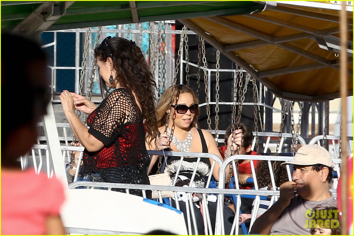 Mariah Carey Jet Sets from NY to LA With Monroe & Moroccan Photo