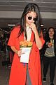 selena gomez lv lfw show heathrow arrival 05