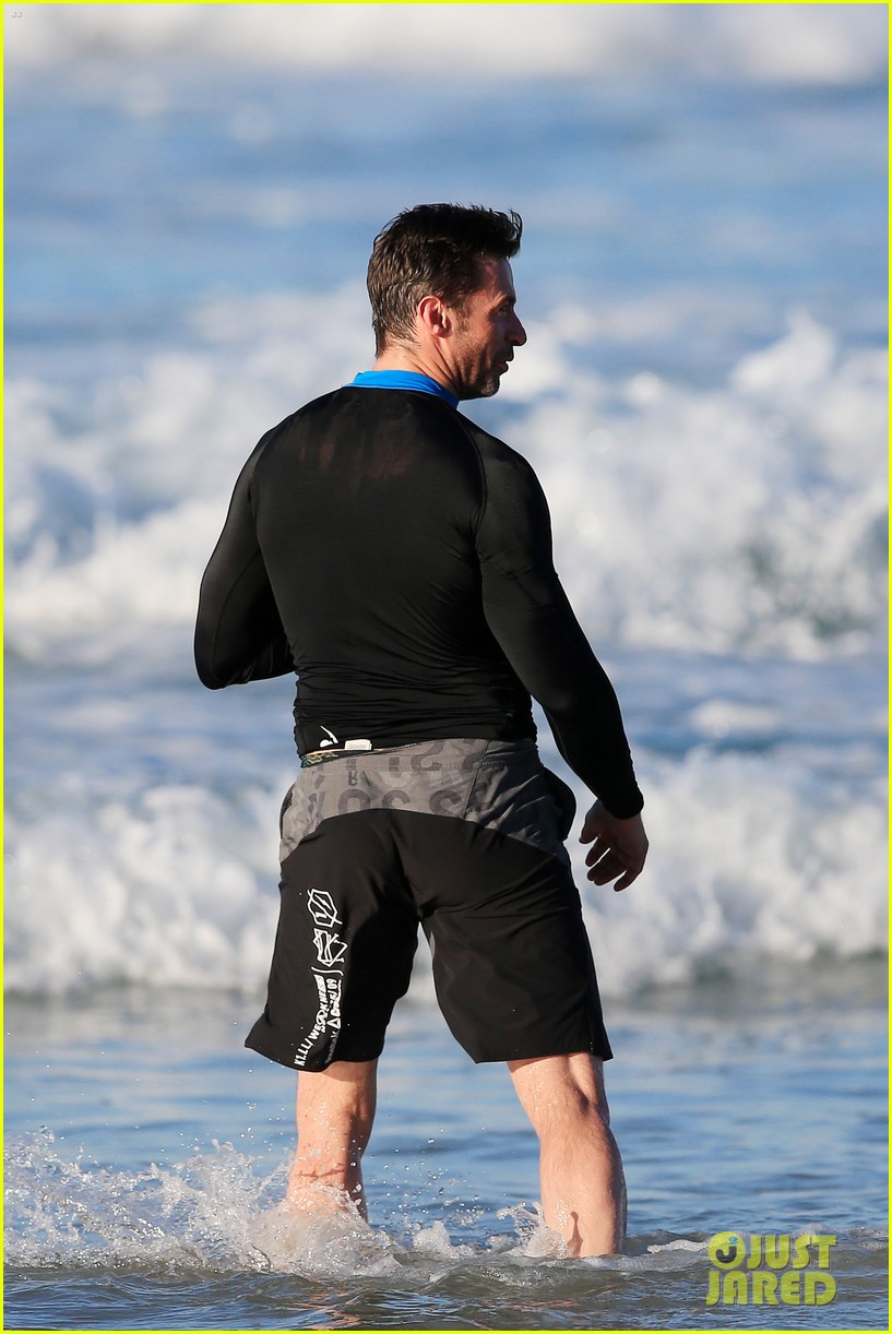 Hugh Jackman's Muscles Are Bulging Out of His Wet Suit!