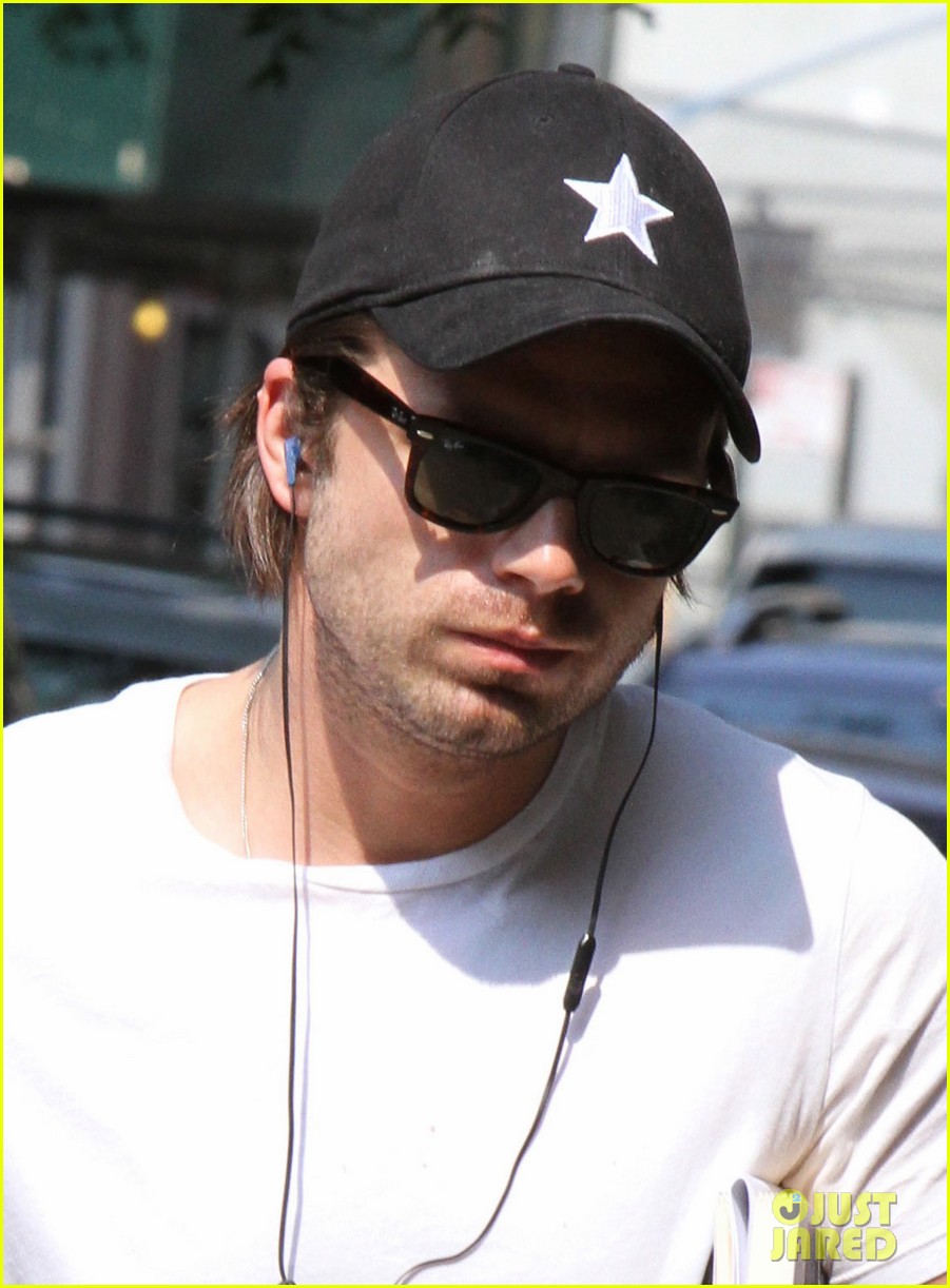 Full Sized Photo of sebastian stan muscles up while strolling the big apple...
