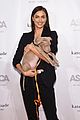 irina shayk sutton foster cuddle puppies at aspca event 10
