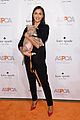 irina shayk sutton foster cuddle puppies at aspca event 13