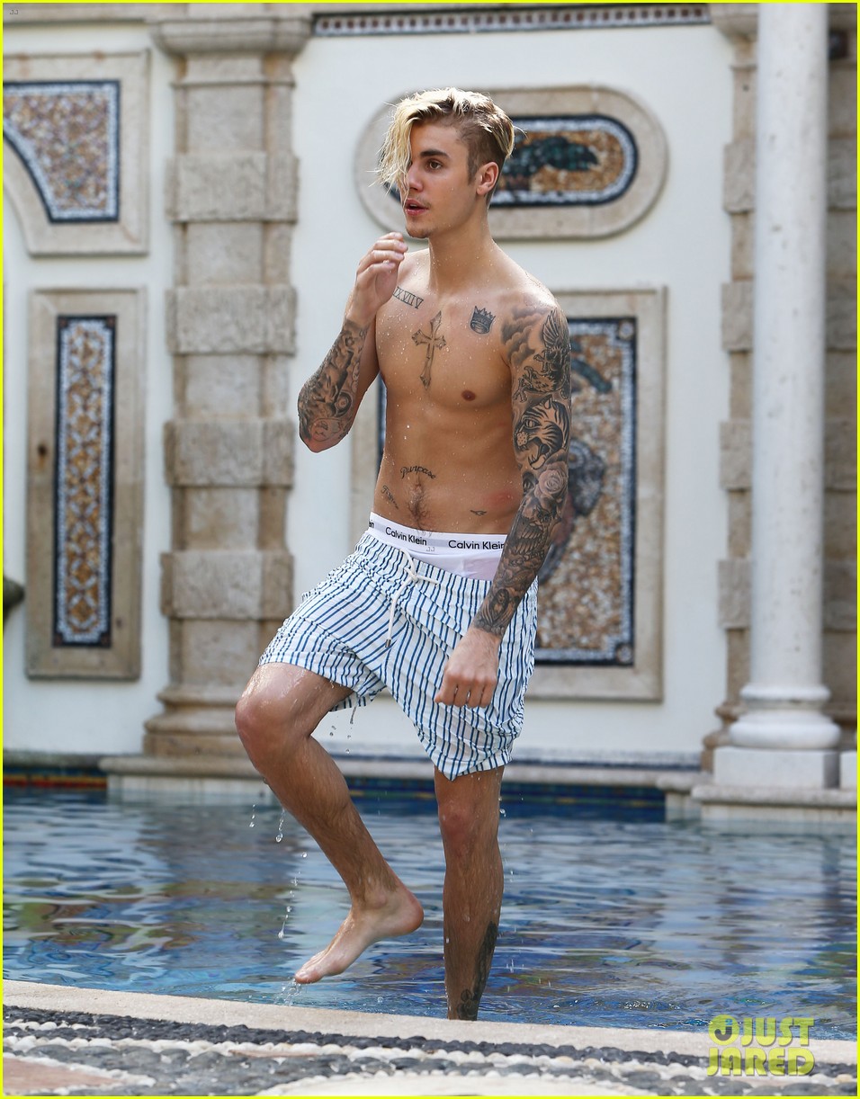 Justin Bieber Goes Shirtless for a Swim at the Versace Mansion justin biebe...