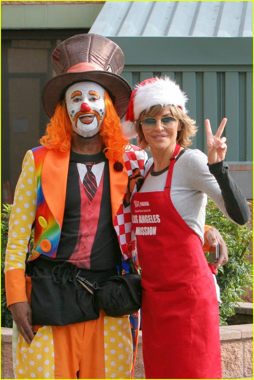 Emmy Rossum & Pharrell Williams Feed Homeless on Christmas Eve Photo