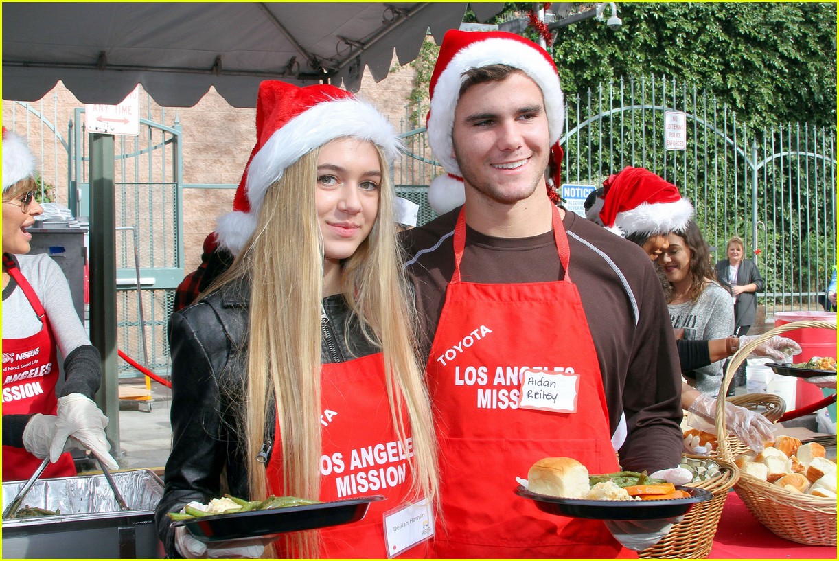 Emmy Rossum & Pharrell Williams Feed Homeless on Christmas Eve Photo